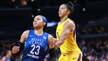 LOS ANGELES, CA - AUGUST 21: Maya Moore #23 of the Minnesota Lynx battles for position against Candace Parker #3 of the Los Angeles Sparks in Round One of the 2018 WNBA Playoffs at Staples Center on August 21, 2018 in Los Angeles, California. (Photo by Leon Bennett/Getty Images)
