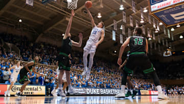 DURHAM, NC - NOVEMBER 11: Alex O'Connell #15 of the Duke Blue Devils goes to the basket against Isaac Neilson #22 of the Utah Valley Wolverines at Cameron Indoor Stadium on November 11, 2017 in Durham, North Carolina. Duke won 99-69. (Photo by Lance King/Getty Images)