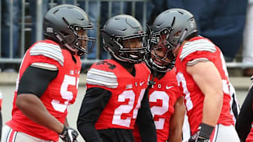 Nov 26, 2016; Columbus, OH, USA; Ohio State Buckeyes safety Malik Hooker (24) is congratulated by teammates following his pick six during the second quarter at Ohio Stadium. Michigan Wolverines lead at half 10-7. Mandatory Credit: Joe Maiorana-USA TODAY Sports