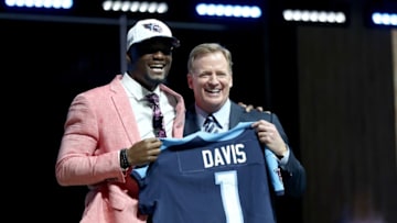 PHILADELPHIA, PA - APRIL 27: Corey Davis of Western Michigan poses with Commissioner of the National Football League Roger Goodell after being picked