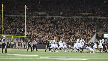 Sep 30, 2023; Iowa City, Iowa, USA; Michigan State Spartans place kicker Jonathan Kim (97) kicks a 57 yard field goal against the Iowa Hawkeyes during the second quarter at Kinnick Stadium. Mandatory Credit: Jeffrey Becker-USA TODAY Sports