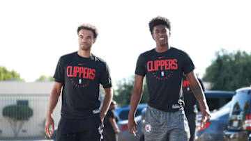 LOS ANGELES, CA - OCTOBER 19: Jerome Robinson #1, and Terance Mann #14 of the LA Clippers arrive to the LA Clippers Feed The Community Event on October 19, 2019 in Los Angeles, California. NOTE TO USER: User expressly acknowledges and agrees that, by downloading and/or using this Photograph, user is consenting to the terms and conditions of the Getty Images License Agreement. Mandatory Copyright Notice: Copyright 2019 NBAE (Photo by Will Navarro/NBAE via Getty Images)