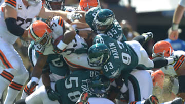 CLEVELAND, OH - SEPTEMBER 09: The the Philadelphia Eagles defense tackles during the game against the Cleveland Browns at Cleveland Browns Stadium on September 9, 2012 in Cleveland, Ohio. The Eagles won 17-16. (Photo by Drew Hallowell/Philadelphia Eagles/Getty Images)