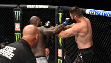 NEW YORK, NEW YORK - NOVEMBER 02: (L-R) Jairzinho Rozenstruik of Suriname punches Andrei Arlovski in their heavyweight bout during the UFC 244 event at Madison Square Garden on November 02, 2019 in New York City. (Photo by Josh Hedges/Zuffa LLC via Getty Images)