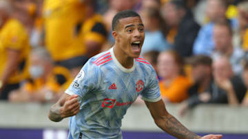 WOLVERHAMPTON, ENGLAND - AUGUST 29: Mason Greenwood of Manchester United celebrates after scoring the winning goal during the Premier League match between Wolverhampton Wanderers and Manchester United at Molineux on August 29, 2021 in Wolverhampton, England. (Photo by James Gill - Danehouse/Getty Images)
