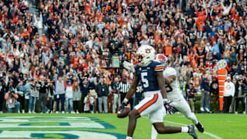 Auburn football wide receiver Kobe Hudson (5) crosses the goal line to score a touchdown during the Iron Bowl at Jordan-Hare Stadium in Auburn, Ala., on Saturday, Nov. 27, 2021. Auburn Tigers leads Alabama Crimson Tide 7-0 at halftime.Auburn football
