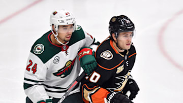 ANAHEIM, CA - NOVEMBER 09: Minnesota Wild defenseman Matt Dumba (24) and Anaheim Ducks leftwing Pontus Aberg (20) fight for position in the third period of a game played on November 11, 2018 at the Honda Center in Anaheim, CA. (Photo by John Cordes/Icon Sportswire via Getty Images)