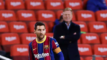 BARCELONA, SPAIN - FEBRUARY 13: Lionel Messi of FC Barcelona controls the ball during the La Liga Santander match between FC Barcelona and Deportivo Alavés at Camp Nou on February 13, 2021 in Barcelona, Spain. Sporting stadiums around Spain remain under strict restrictions due to the Coronavirus Pandemic as Government social distancing laws prohibit fans inside venues resulting in games being played behind closed doors. (Photo by Eric Alonso/Getty Images)