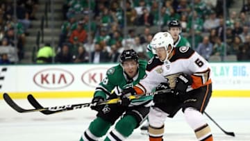 DALLAS, TX - OCTOBER 13: Tyler Pitlick #18 of the Dallas Stars and Rickard Rakell #67 of the Anaheim Ducks at American Airlines Center on October 13, 2018 in Dallas, Texas. (Photo by Ronald Martinez/Getty Images)
