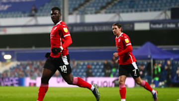 LONDON, ENGLAND - MARCH 03: Daryl Dike of Barnsley celebrates after scoring their side's first goal during the Sky Bet Championship match between Queens Park Rangers and Barnsley at The Kiyan Prince Foundation Stadium on March 03, 2021 in London, England. Sporting stadiums around the UK remain under strict restrictions due to the Coronavirus Pandemic as Government social distancing laws prohibit fans inside venues resulting in games being played behind closed doors. (Photo by Clive Rose/Getty Images)