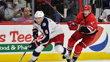 RALEIGH, NC - OCTOBER 10: Columbus Blue Jackets Defenceman Zach Werenski (8) skates past Carolina Hurricanes Left Wing Joakim Nordstrom (42) in a game between the Columbus Blue Jackets and the Carolina Hurricanes at the PNC Arena in Raleigh, NC on October 10, 2017. Columbus defeated Carolina 2 - 1 in overtime. (Photo by Greg Thompson/Icon Sportswire via Getty Images)