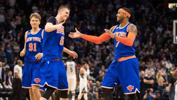 Nov 30, 2016; Minneapolis, MN, USA; New York Knicks forward Carmelo Anthony (7) celebrates his game-winning shot with forward Kristaps Porzingis (6) during the fourth quarter against the Minnesota Timberwolves at Target Center. The Knicks defeated the Timberwolves 106-104. Mandatory Credit: Brace Hemmelgarn-USA TODAY Sports