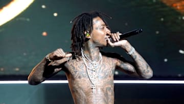 LOS ANGELES, CA - JUNE 22: Recording artist Wiz Khalifa performs onstage at night one of the 2017 BET Experience STAPLES Center Concert, sponsored by Hulu, at Staples Center on June 22, 2017 in Los Angeles, California. (Photo by Bennett Raglin/Getty Images for BET)