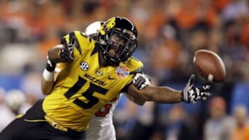 Jan 3, 2014; Arlington, TX, USA; Missouri Tigers wide receiver Dorial Green-Beckham (15) cannot make a catch while defended by Oklahoma State Cowboys cornerback Tyler Patmon (26) in the second quarter at the 2014 Cotton Bowl at AT&T Stadium. Mandatory Credit: Tim Heitman-USA TODAY Sports
