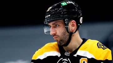 BOSTON, MASSACHUSETTS - MARCH 11: Patrice Bergeron #37 of the Boston Bruins looks on during the second period against the New York Rangers at TD Garden on March 11, 2021 in Boston, Massachusetts. (Photo by Maddie Meyer/Getty Images)