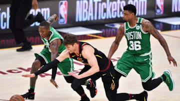 CLEVELAND, OH - MAY 21: Kyle Korver #26 of the Cleveland Cavaliers competes for a loose ball against Terry Rozier #12 and Marcus Smart #36 of the Boston Celtics in the second half during Game Four of the 2018 NBA Eastern Conference Finals at Quicken Loans Arena on May 21, 2018 in Cleveland, Ohio. NOTE TO USER: User expressly acknowledges and agrees that, by downloading and or using this photograph, User is consenting to the terms and conditions of the Getty Images License Agreement. (Photo by Jamie Sabau/Getty Images)
