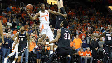 Nov 26, 2016; Brooklyn, NY, USA; Syracuse Orange guard Frank Howard (1) passes the ball over South Carolina Gamecocks forward Chris Silva (30) during the first half of the Brooklyn Hoops Holiday Invitational at Barclays Center. Mandatory Credit: Vincent Carchietta-USA TODAY Sports