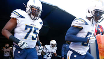 DENVER, CO - JANUARY 3: San Diego Chargers players, from left Chris Hairston