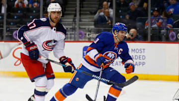 NEW YORK, NY - FEBRUARY 13: John Tavares #91 of the New York Islanders in action against Brandon Dubinsky #17 of the Columbus Blue Jackets at Barclays Center on February 13, 2018 in New York City. The Blue Jackets defeated the Islanders 4-1. (Photo by Jim McIsaac/NHLI via Getty Images)