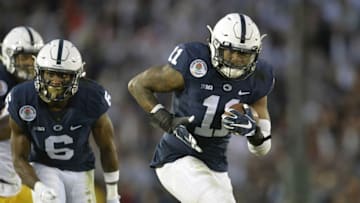 January 2, 2017; Pasadena, CA, USA; Penn State Nittany Lions linebacker Brandon Bell (11) recovers the ball on a turnover against the Southern California Trojans during the second half of the 2017 Rose Bowl game at the Rose Bowl. Mandatory Credit: Gary A. Vasquez-USA TODAY Sports