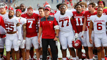 NORMAN, OK - APRIL 23: Head coach Brent Venables of the Oklahoma Sooners stands with his team for the alma mater during their spring game at Gaylord Family Oklahoma Memorial Stadium on April 23, 2022 in Norman, Oklahoma. (Photo by Brian Bahr/Getty Images)