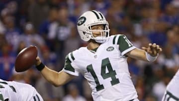 Sep 15, 2016; Orchard Park, NY, USA; New York Jets quarterback Ryan Fitzpatrick (14) throws a pass during the second half against the Buffalo Bills at New Era Field. The Jets beat the Bills 37-31. Mandatory Credit: Timothy T. Ludwig-USA TODAY Sports