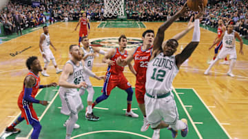 BOSTON, MA - APRIL 30: Terry Rozier #12 of the Boston Celtics grabs a rebound overErsan Ilyasova #23 of the Philadelphia 76ers during Game One in Round Two of the 2018 NBA Playoffs at TD Garden on April 30, 2018 in Boston, Massachusetts. The Celtics defeat the 76ers 117-101. (Photo by Maddie Meyer/Getty Images)