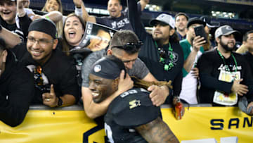 SAN DIEGO, CALIFORNIA - MARCH 17: Trent Richardson #33 of the Birmingham Iron celebrates with fans after defeating the San Diego Fleet 32-29 in an Alliance of American Football game at SDCCU Stadium on March 17, 2019 in San Diego, California. (Photo by John McCoy/AAF/Getty Images)