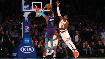 NEW YORK, NEW YORK - NOVEMBER 16: Devonte' Graham #4 of the Charlotte Hornets hits a three point basket with 2 seconds left in the fourth quarter to win the game against the New York Knicks at Madison Square Garden on November 16, 2019 in New York City. Charlotte Hornets defeated the Charlotte Hornets 103-102. NOTE TO USER: User expressly acknowledges and agrees that, by downloading and or using this photograph, User is consenting to the terms and conditions of the Getty Images License Agreement. (Photo by Mike Stobe/Getty Images)