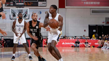 LAS VEGAS, NV - JULY 13: Edmond Sumner #5 of the Indiana Pacers handles the ball against the Brooklyn Nets during the 2018 Las Vegas Summer League on July 13, 2018 at the Cox Pavilion in Las Vegas, Nevada. NOTE TO USER: User expressly acknowledges and agrees that, by downloading and/or using this photograph, user is consenting to the terms and conditions of the Getty Images License Agreement. Mandatory Copyright Notice: Copyright 2018 NBAE (Photo by David Dow/NBAE via Getty Images)