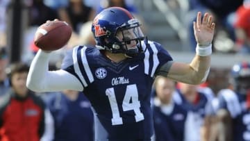 Oct 4, 2014; Oxford, MS, USA; Mississippi Rebels quarterback Bo Wallace (14) passes during the first half against Alabama Crimson Tide at Vaught-Hemingway Stadium. Mandatory Credit: Christopher Hanewinckel-USA TODAY Sports