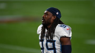 DENVER, CO - SEPTEMBER 14: Jadeveon Clowney #99 of the Tennessee Titans walks on the field before a game against the Denver Broncos at Empower Field at Mile High on September 14, 2020 in Denver, Colorado. (Photo by Dustin Bradford/Getty Images)
