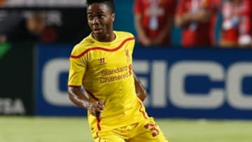 Aug 4, 2014; Miami Gardens, FL, USA; Liverpool midfielder Raheem Sterling (31) kicks the ball in the first half of a game against Manchester United at Sun Life Stadium. Mandatory Credit: Robert Mayer-USA TODAY Sports