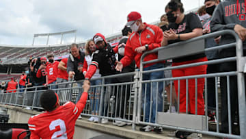 COLUMBUS, OH - APRIL 17: Chris Olave #2 of the Ohio State Buckeyes greets fans after the Spring Game at Ohio Stadium on April 17, 2021 in Columbus, Ohio. (Photo by Jamie Sabau/Getty Images)