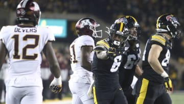 IOWA CITY, IOWA- NOVEMBER 16: Wide receiver Ihmir Smith-Marsette #6 of the Iowa Hawkeyes signals a first down during the second half in front of defensive lineman TaiYon Devers #12 of the Minnesota Gophers on November 16, 2019 at Kinnick Stadium in Iowa City, Iowa. (Photo by Matthew Holst/Getty Images)