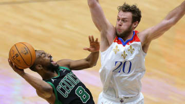 Kemba Walker #8 of the Boston Celtics drives against Nicolo Melli #20 of the New Orleans Pelicans (Photo by Jonathan Bachman/Getty Images)