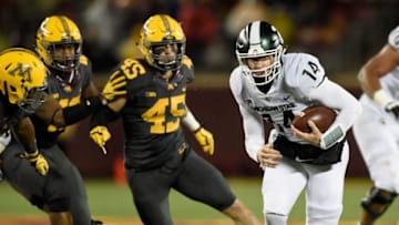 MINNEAPOLIS, MN - OCTOBER 14: Brian Lewerke #14 of the Michigan State Spartans carries the ball against the Minnesota Golden Gophers during the third quarter of the game on October 14, 2017 at TCF Bank Stadium in Minneapolis, Minnesota. The Spartans defeated the Gophers 30-27. (Photo by Hannah Foslien/Getty Images)