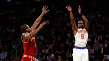 Jan 30, 2014; New York, NY, USA; New York Knicks shooting guard Tim Hardaway Jr. (5) shoots over Cleveland Cavaliers shooting guard Dion Waiters (3) for three during the fourth quarter at Madison Square Garden. New York Knicks won 117-86. Mandatory Credit: Anthony Gruppuso-USA TODAY Sports
