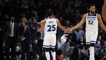 MINNEAPOLIS, MN - FEBRUARY 11: Derrick Rose #25 of the Minnesota Timberwolves hi-fives Karl-Anthony Towns #32. Copyright 2019 NBAE (Photo by Jordan Johnson/NBAE via Getty Images)