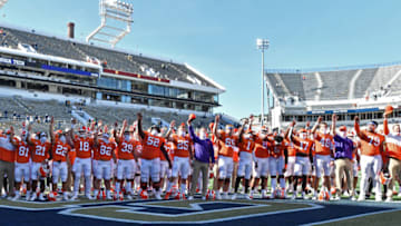 Oct 17, 2020; Atlanta, GA, USA; Clemson players and coaching staff wave to their fans after Clemson won 73-7 during an NCAA college football game at Bobby Dodd Stadium. Mandatory Credit: Hyosub Shin/Pool Photo-USA TODAY Sports