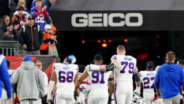 Buffalo Bills offensive tackle Spencer Brown (79) embraces Buffalo Bills defensive tackle Ed Oliver. (Syndication: The Enquirer)