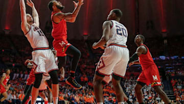 CHAMPAIGN, IL - FEBRUARY 07: Eric Ayala #5 of the Maryland Terrapins shoots a reverse layup against Giorgi Bezhanishvili #15 of the Illinois Fighting Illini and draws a foul during the second half at State Farm Center on February 7, 2020 in Champaign, Illinois. (Photo by Michael Hickey/Getty Images)
