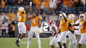 JACKSONVILLE, FL - JANUARY 02: Tennessee Volunteers players celebrate celebrate in the closing seconds of the TaxSlayer Gator Bowl against the Indiana Hoosiers at TIAA Bank Field on January 2, 2020 in Jacksonville, Florida. Tennessee defeated Indiana 23-22. (Photo by Joe Robbins/Getty Images)