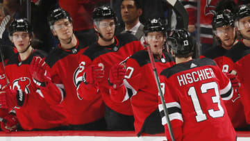 NEWARK, NJ - DECEMBER 27: Nico Hischier #13 of the New Jersey Devils is congratulated after scoring a goal against and the Toronto Maple Leafs during the game at the Prudential Center on December 27, 2019 in Newark, New Jersey. (Photo by Andy Marlin/NHLI via Getty Images)