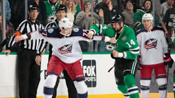 DALLAS, TX - NOVEMBER 12: Jamie Benn #14 of the Dallas Stars gets physical against Josh Anderson #77 of the Columbus Blue Jackets at the American Airlines Center on November 12, 2018 in Dallas, Texas. (Photo by Glenn James/NHLI via Getty Images)