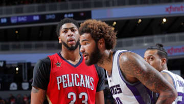 SACRAMENTO, CA - NOVEMBER 8: Anthony Davis #23 of the New Orleans Pelicans faces off against Willie Cauley-Stein #00 of the Sacramento Kings on November 8, 2016 at Golden 1 Center in Sacramento, California. NOTE TO USER: User expressly acknowledges and agrees that, by downloading and or using this photograph, User is consenting to the terms and conditions of the Getty Images Agreement. Mandatory Copyright Notice: Copyright 2016 NBAE (Photo by Rocky Widner/NBAE via Getty Images)