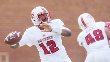 Oct 24, 2015; Winston-Salem, NC, USA; North Carolina State Wolfpack quarterback Jacoby Brissett (12) passes the ball during the third quarter against the Wake Forest Demon Deacons at BB&T Field. North Carolina State defeated Wake Forest 35-17. Mandatory Credit: Jeremy Brevard-USA TODAY Sports