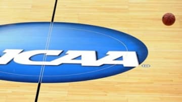 Mar 20, 2013; Salt Lake City, UT, USA; A ball bounces through the NCAA logo during practice the day before the second round of the 2013 NCAA tournament at EnergySolutions Arena. Mandatory Credit: Steve Dykes-USA TODAY Sports