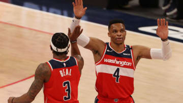 Russell Westbrook #4 of the Washington Wizards celebrates with teammate Bradley Beal #3 (Photo by Patrick Smith/Getty Images)
