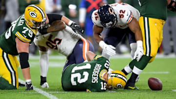 GREEN BAY, WI - SEPTEMBER 09: Aaron Rodgers #12 of the Green Bay Packers lays on the ground after injuring his leg in the second quarter of a game against the Chicago Bears at Lambeau Field on September 9, 2018 in Green Bay, Wisconsin. (Photo by Stacy Revere/Getty Images)